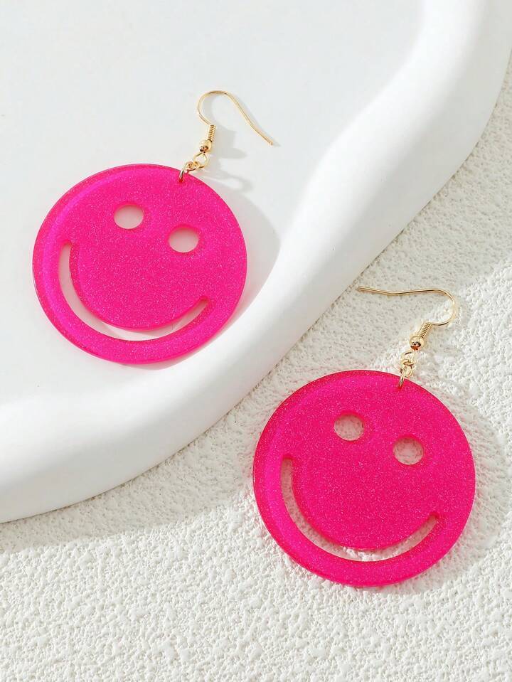 "Colorful acrylic smiley face earrings" "Playful smiley earrings for a cheerful look" "Acrylic stud earrings with smiley face design" "Vibrant smiley earrings for expressive style" "Quirky smiley face accessory in acrylic" "Lighthearted smiley earrings to brighten your day" "Acrylic drop earrings featuring smiley faces" "Statement earrings with joyful smiley motifs" "Funky acrylic earrings with smiley patterns" "Fun and fashionable smiley face ear studs"