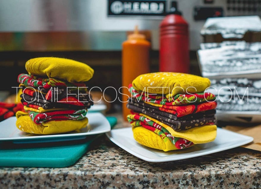 a couple of cakes that are on a table 