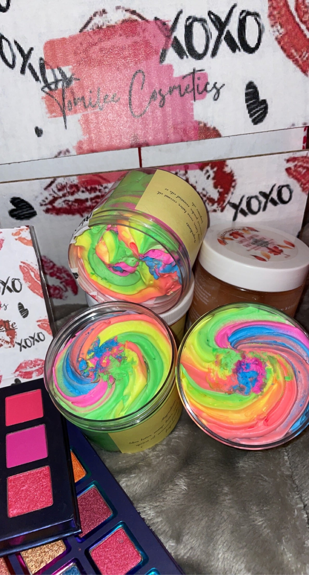 a table topped with lots of different colored cups 